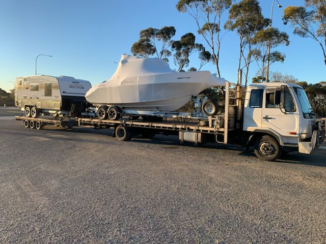 Whittley 2600 and a Montanna Caravan being Transported to Perth Western Australia