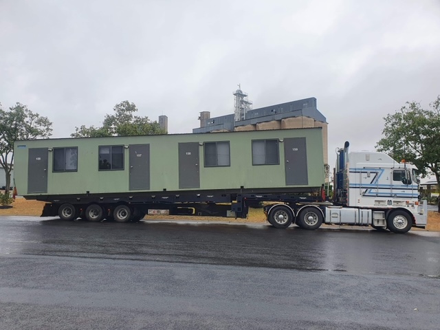 Portable building transport